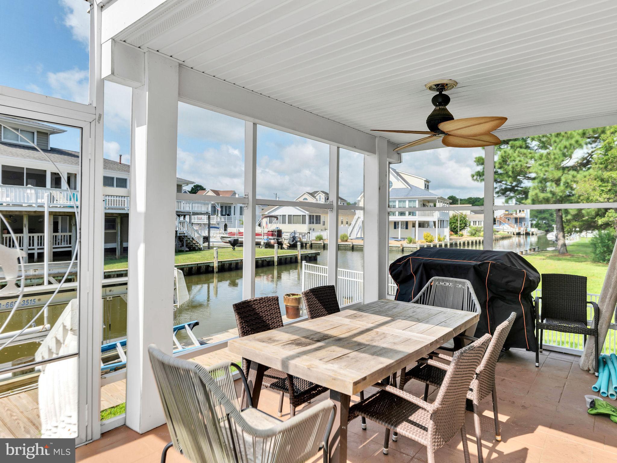 12608 Selsey Road Ocean City, MD 21842 - Photo 47 of 66 a dining room with furniture and window