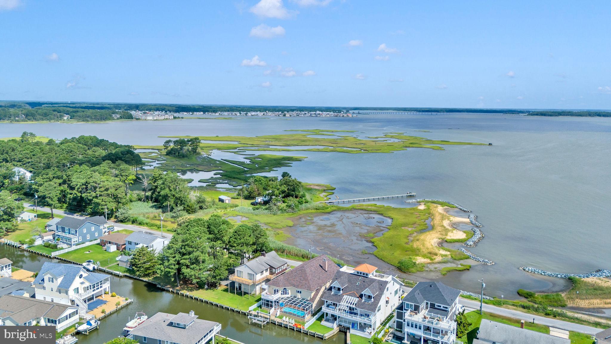 12608 Selsey Road Ocean City, MD 21842 - Photo 52 of 66 an aerial view of ocean and residential houses with outdoor space