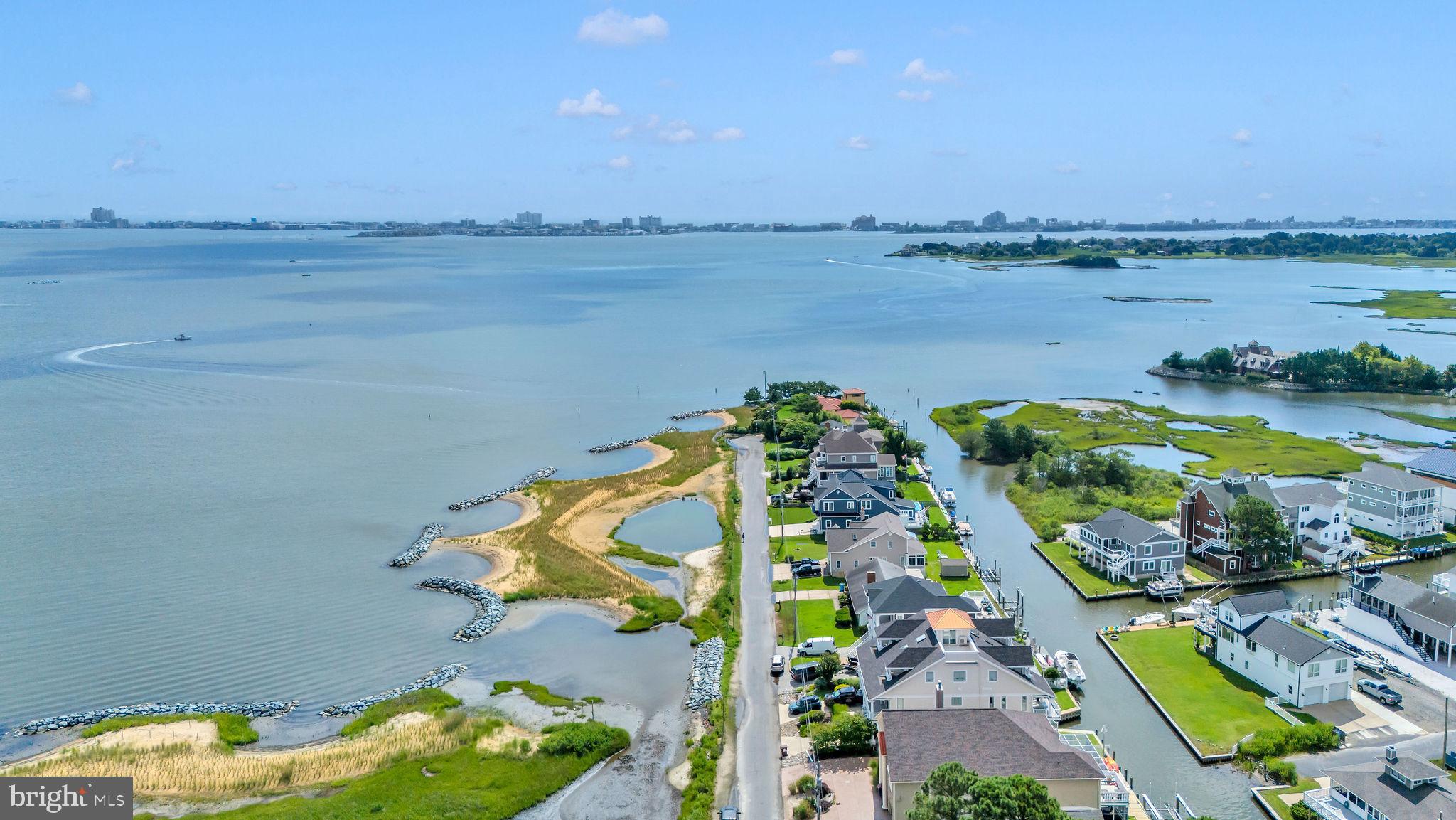12608 Selsey Road Ocean City, MD 21842 - Photo 66 of 66 an aerial view of a house with a lake view