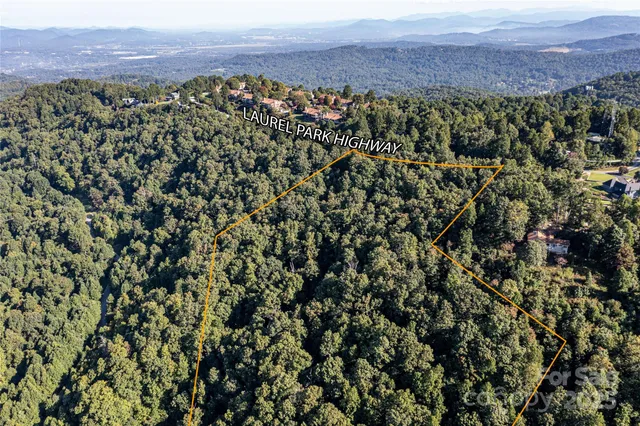 a view of a city with mountain