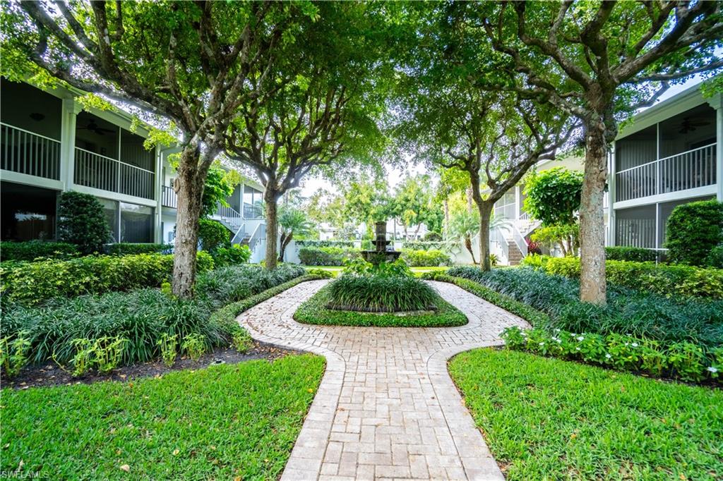 388 4th Avenue South, Unit 388 Naples, FL 34102 - Photo 14 of 15 a view of a garden with pathway