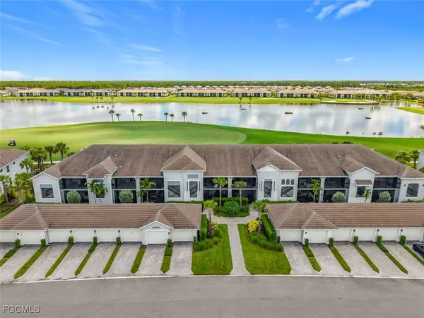 a view of swimming pool with seating area
