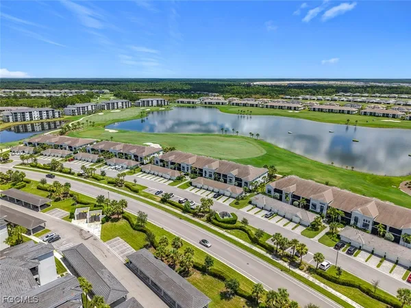 a view of a city with a lake