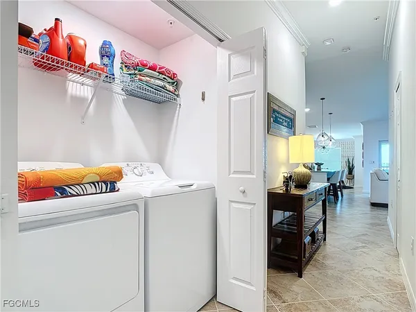 a view of a couch in wooden floor