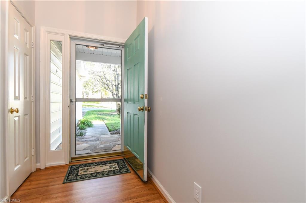 5407 Chestnut Ridge Drive Summerfield, NC 27358 - Photo 3 of 20 Foyer with convenient coat closet