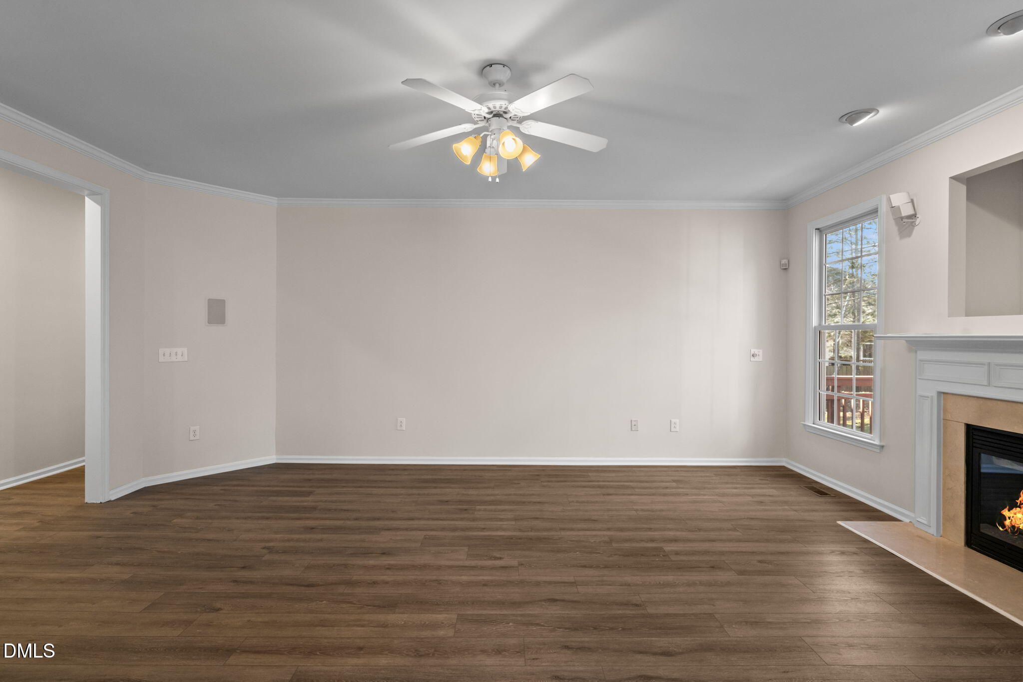 707 Martry Road Durham, NC 27713 - Photo 10 of 61 wooden floor in an empty room with a window