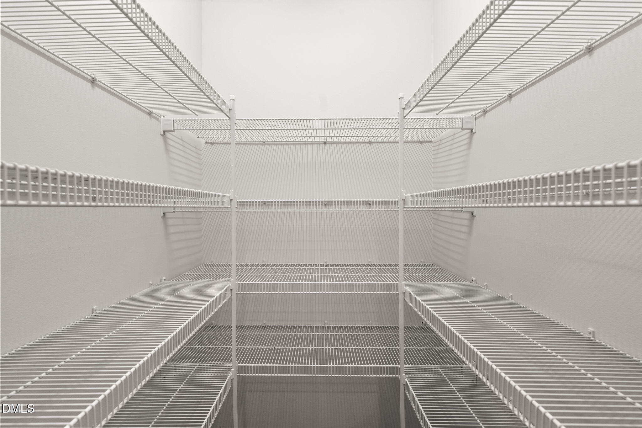 707 Martry Road Durham, NC 27713 - Photo 19 of 61 a view of a room with racks on the wall