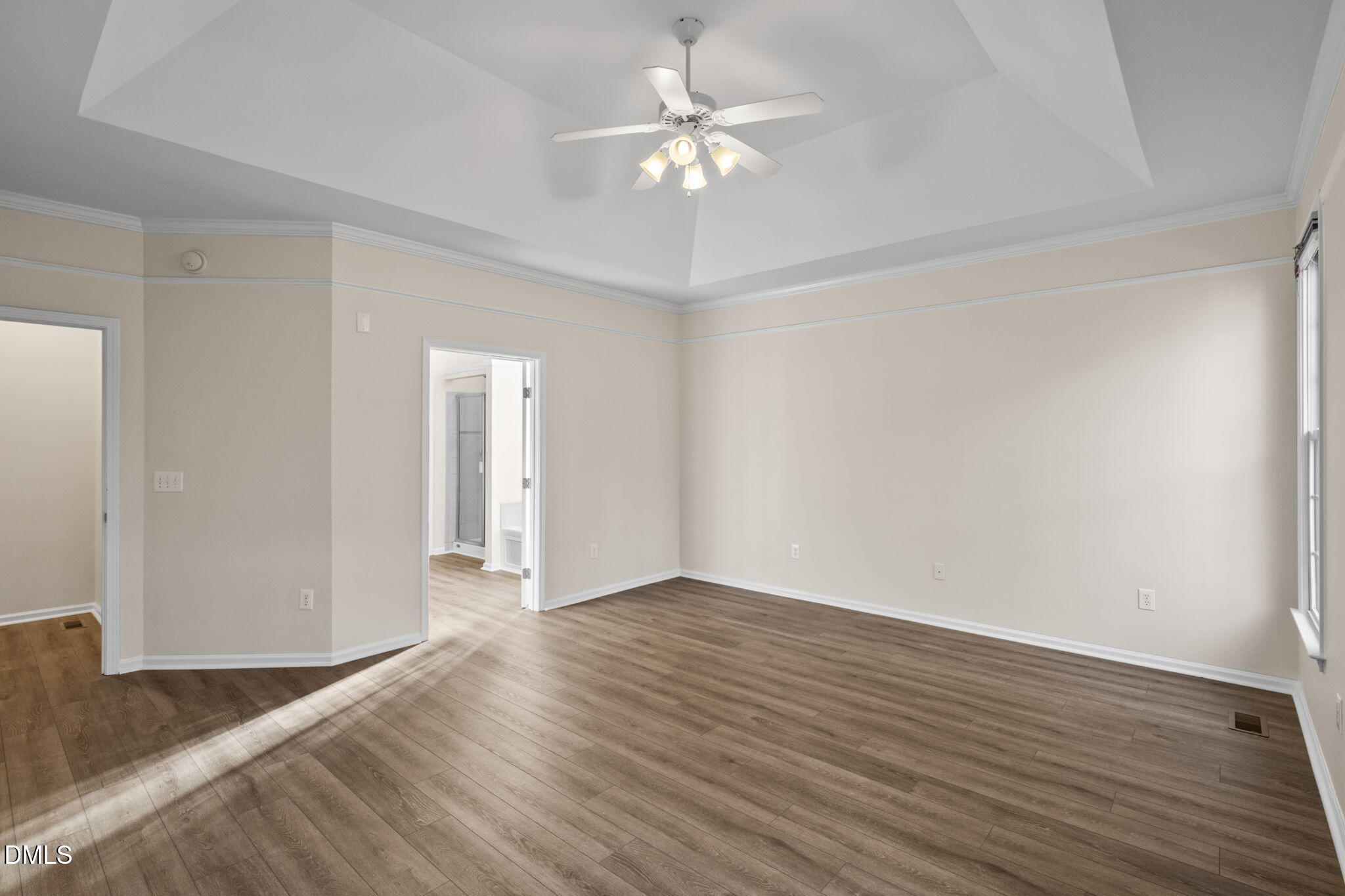 707 Martry Road Durham, NC 27713 - Photo 21 of 61 a view of an empty room with wooden floor