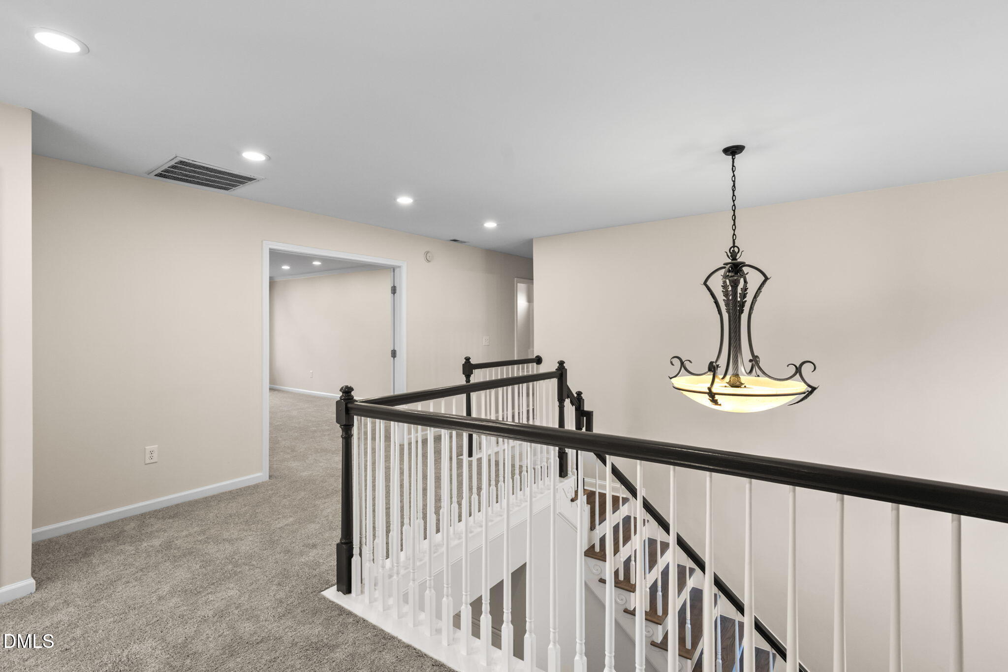 707 Martry Road Durham, NC 27713 - Photo 29 of 61 a view of a hallway with windows