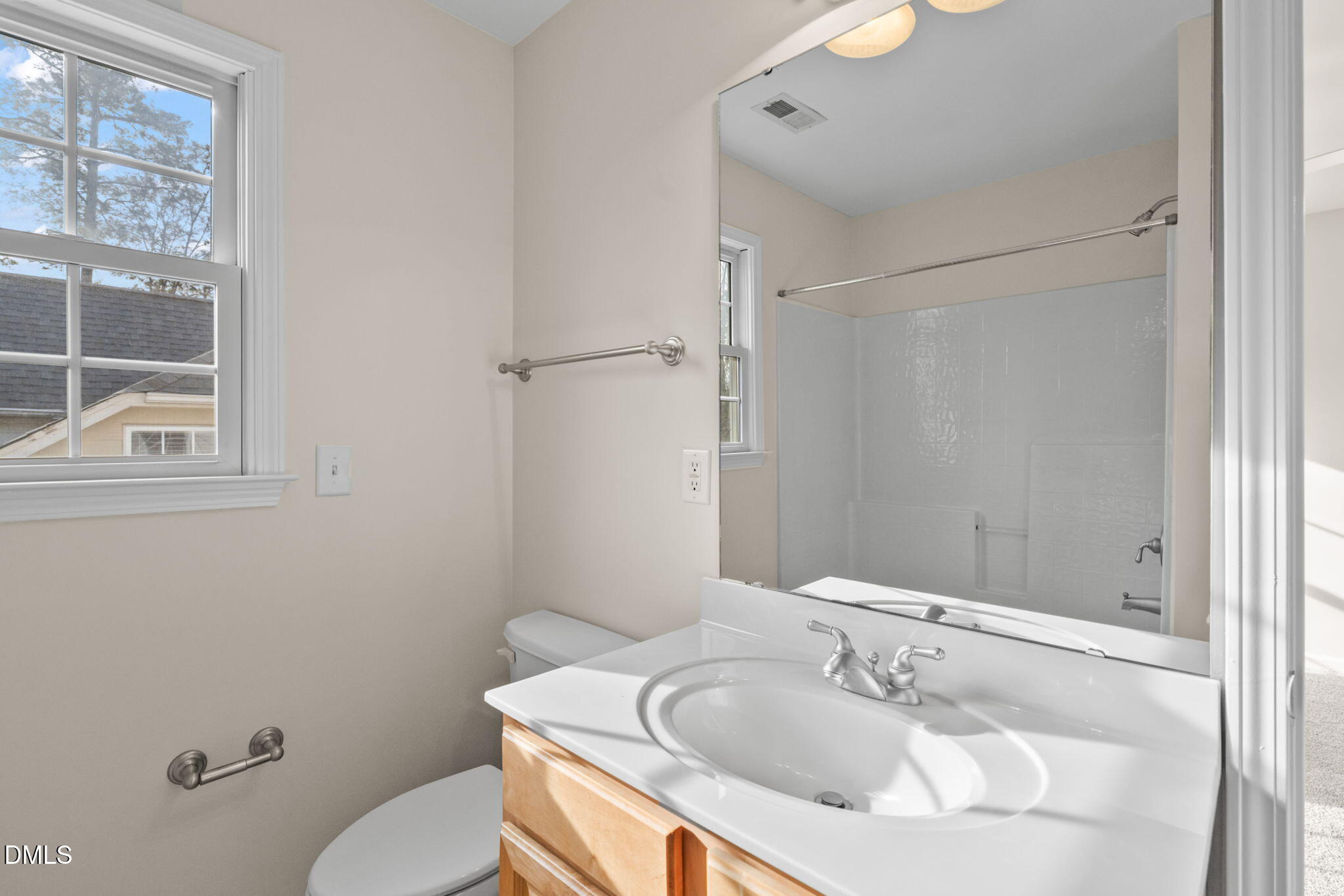 707 Martry Road Durham, NC 27713 - Photo 32 of 61 a bathroom with a sink and toilet