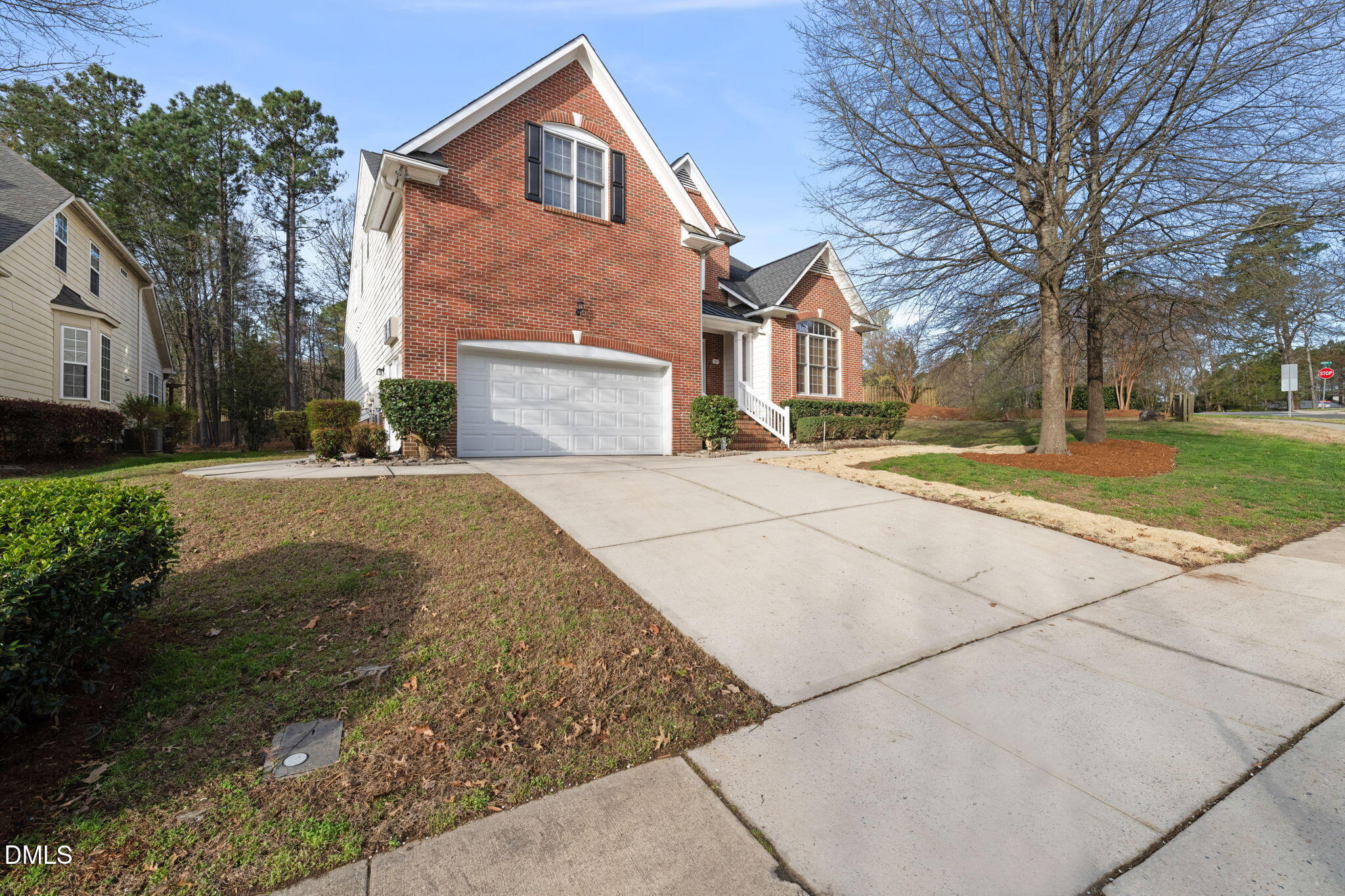 707 Martry Road Durham, NC 27713 - Photo 55 of 61 a view of a house with a yard and garage