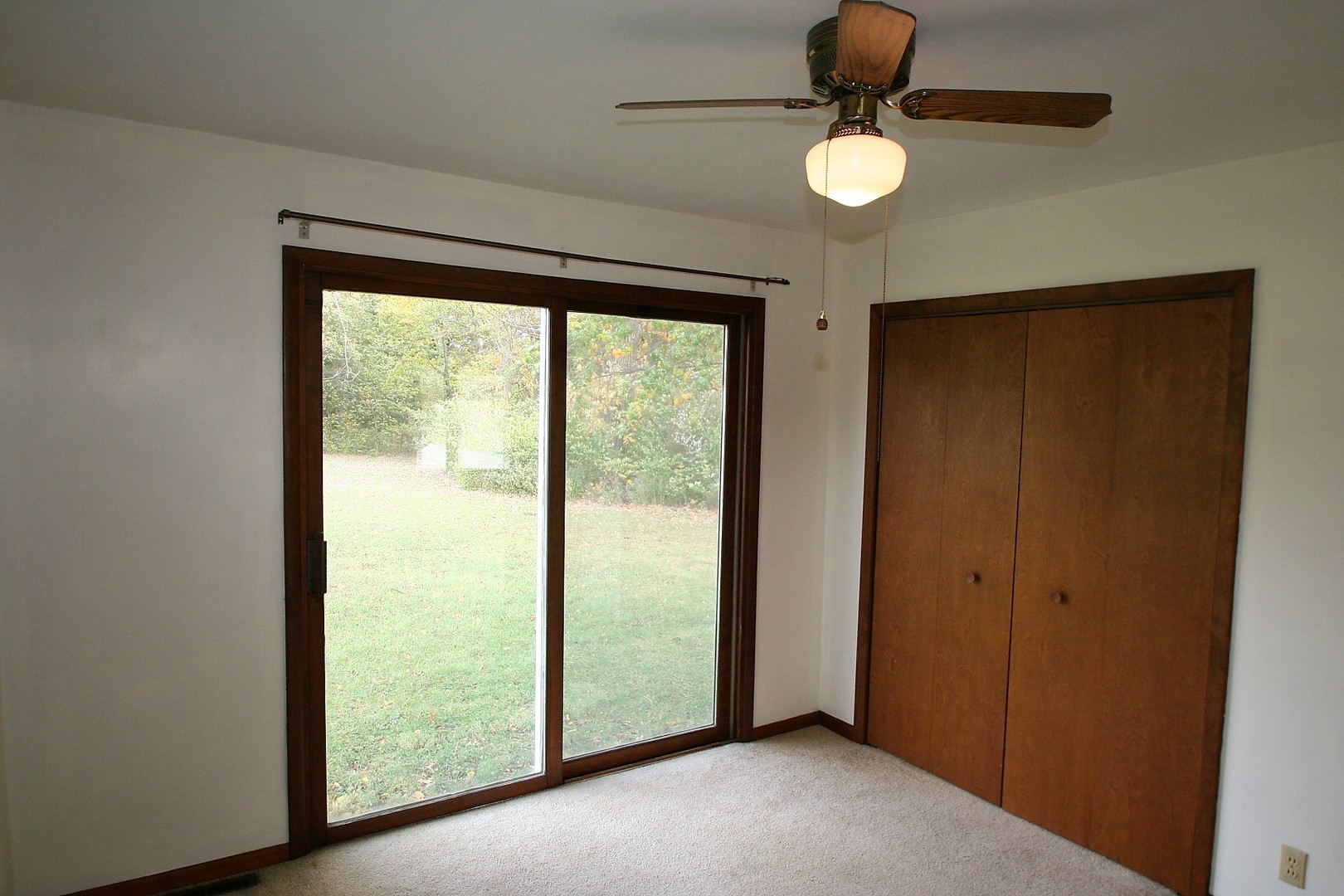 15998 Dee-Mac Road Mackinaw, IL 61755 - Photo 12 of 22 a view of an empty room with window
