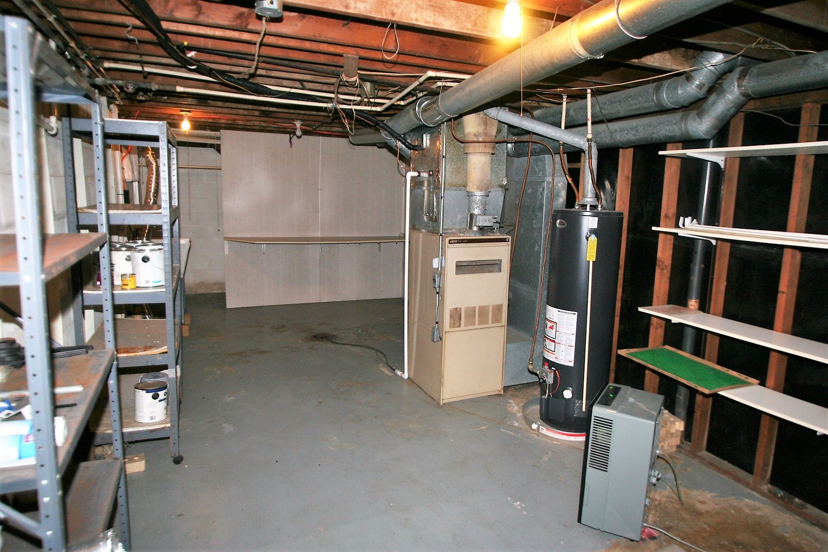 15998 Dee-Mac Road Mackinaw, IL 61755 - Photo 16 of 22 a view of walk in closet with clothes and shoes
