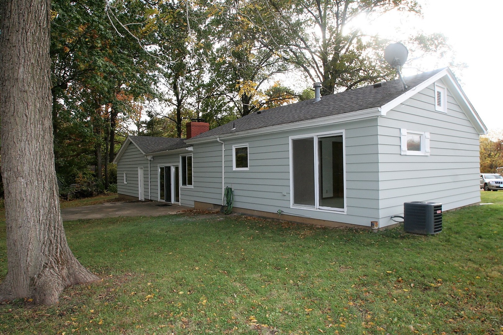 15998 Dee-Mac Road Mackinaw, IL 61755 - Photo 20 of 22 a view of a house with a yard