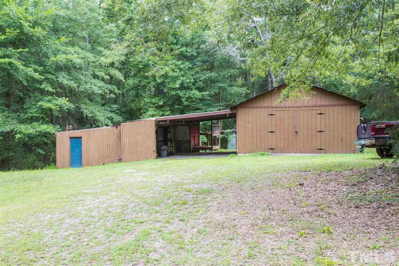 7904 Secluded Acres Road Apex, NC 27523 - Photo 19 of 19 Right side is 20 x 24 wired workshop