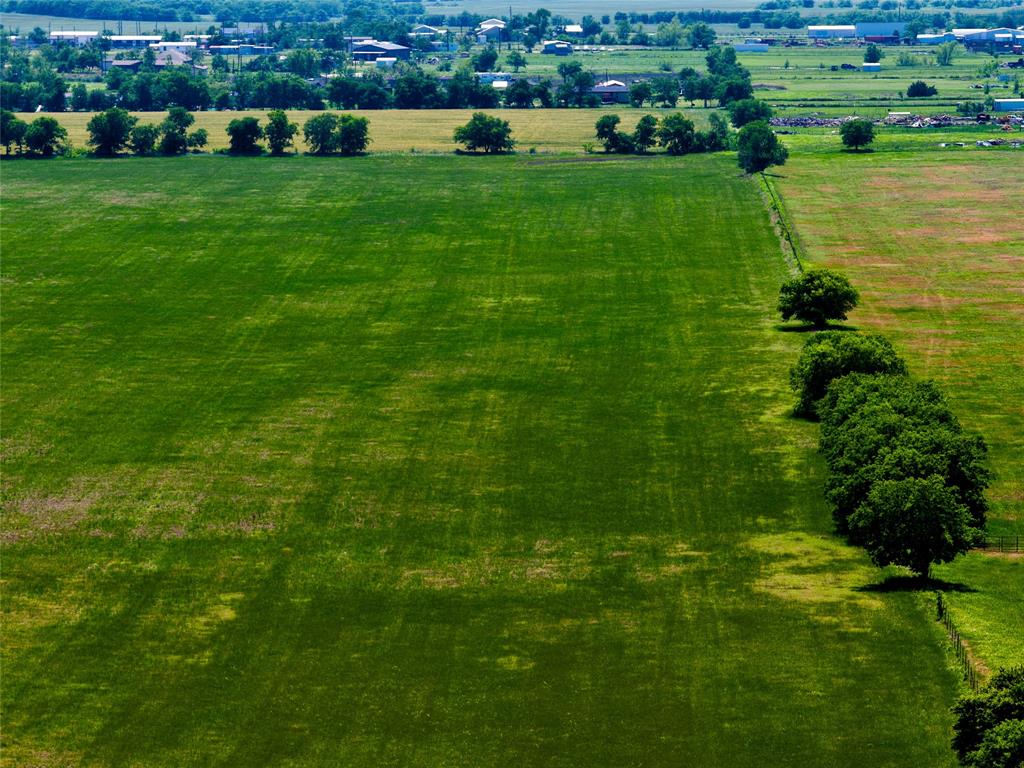 204 Valley View Valley View, TX 76272 - Photo 5 of 23 a view of a green field with lawn chairs
