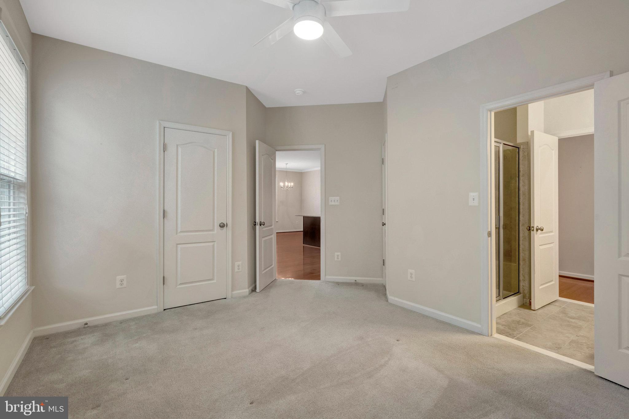 41841 Diabase Square Aldie, VA 20105 - Photo 16 of 45 an empty room with windows and bathroom view