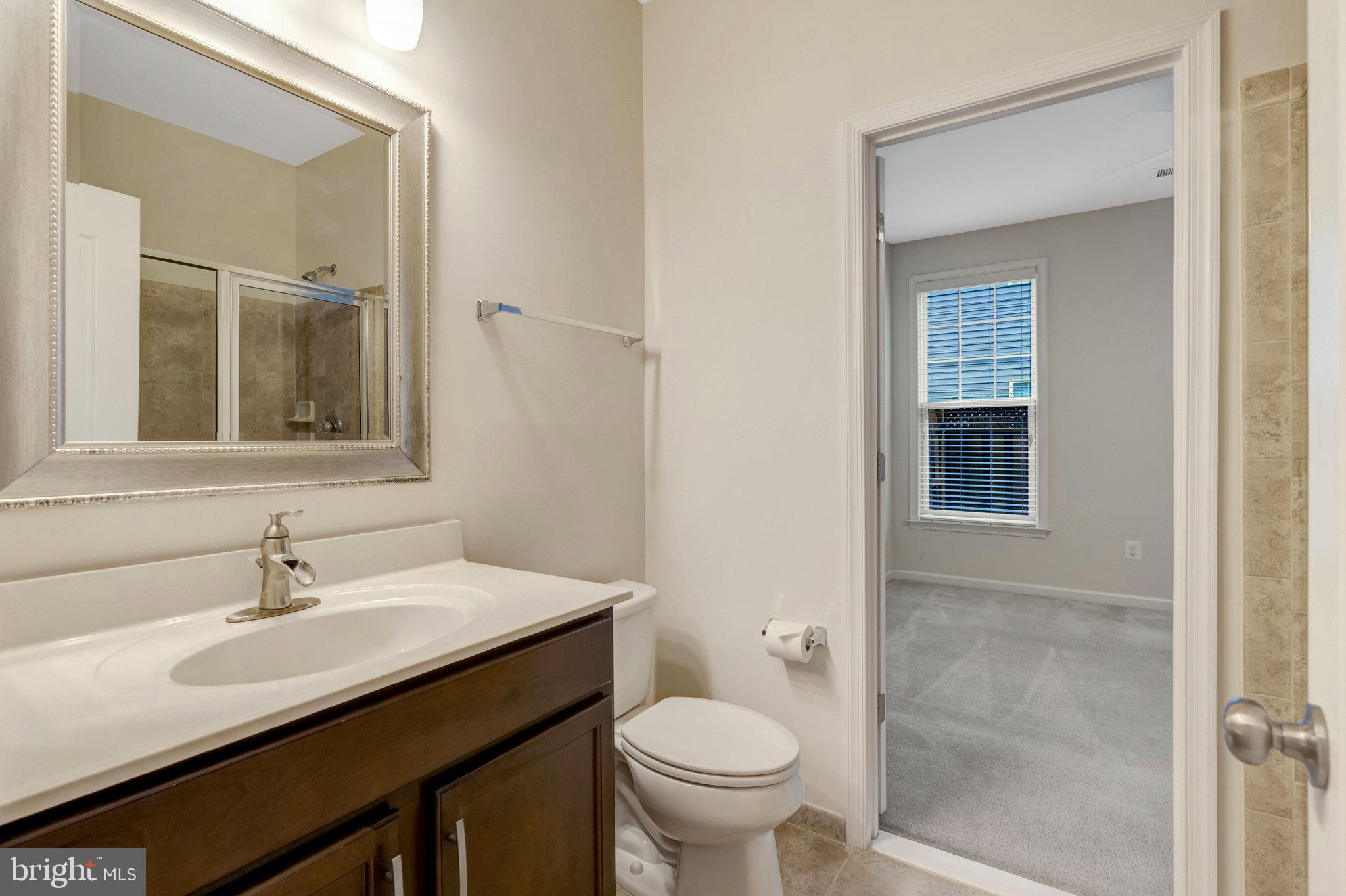 41841 Diabase Square Aldie, VA 20105 - Photo 17 of 45 a bathroom with a sink and a toilet