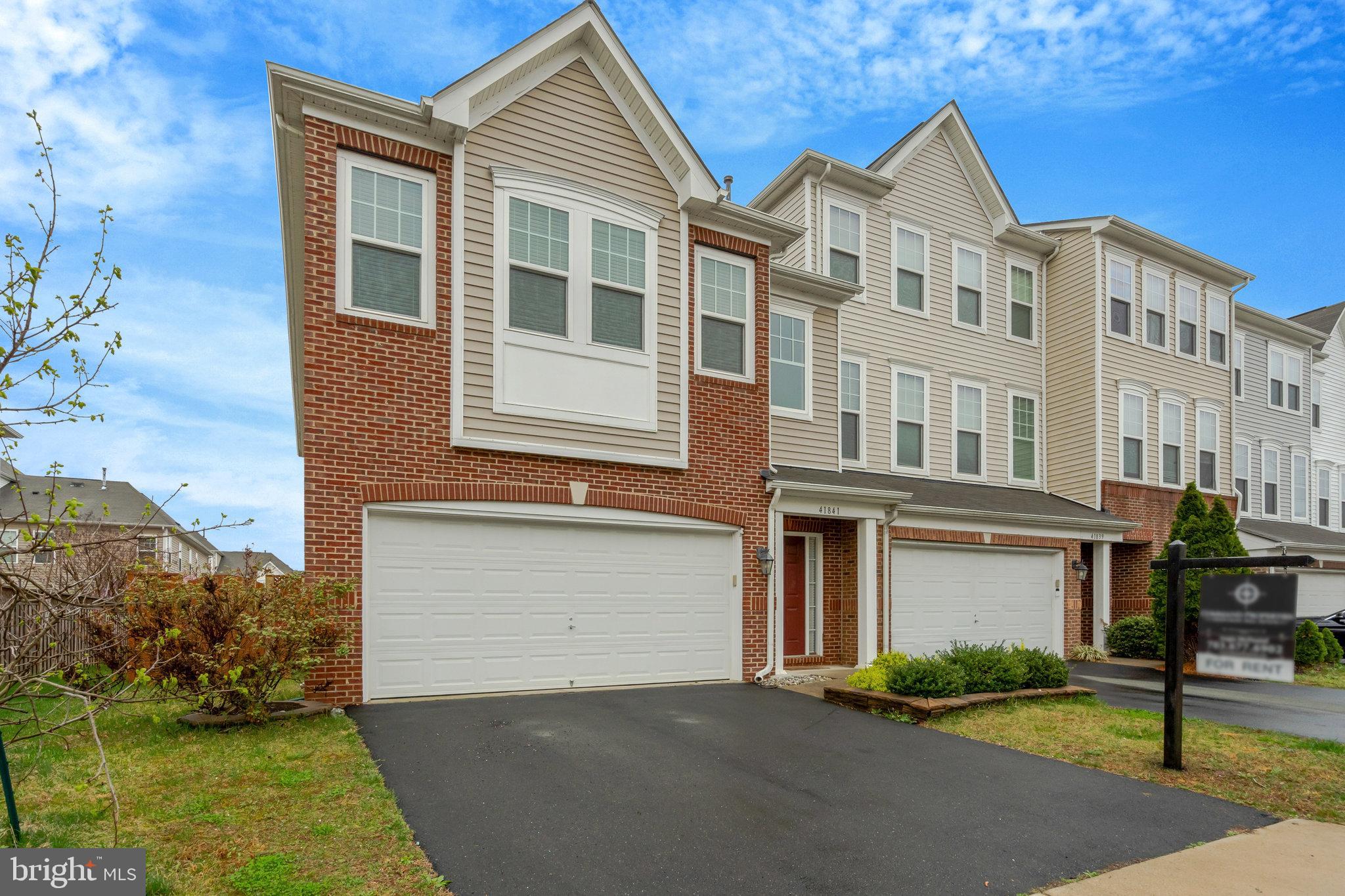 41841 Diabase Square Aldie, VA 20105 - Photo 2 of 45 a front view of a house with garden