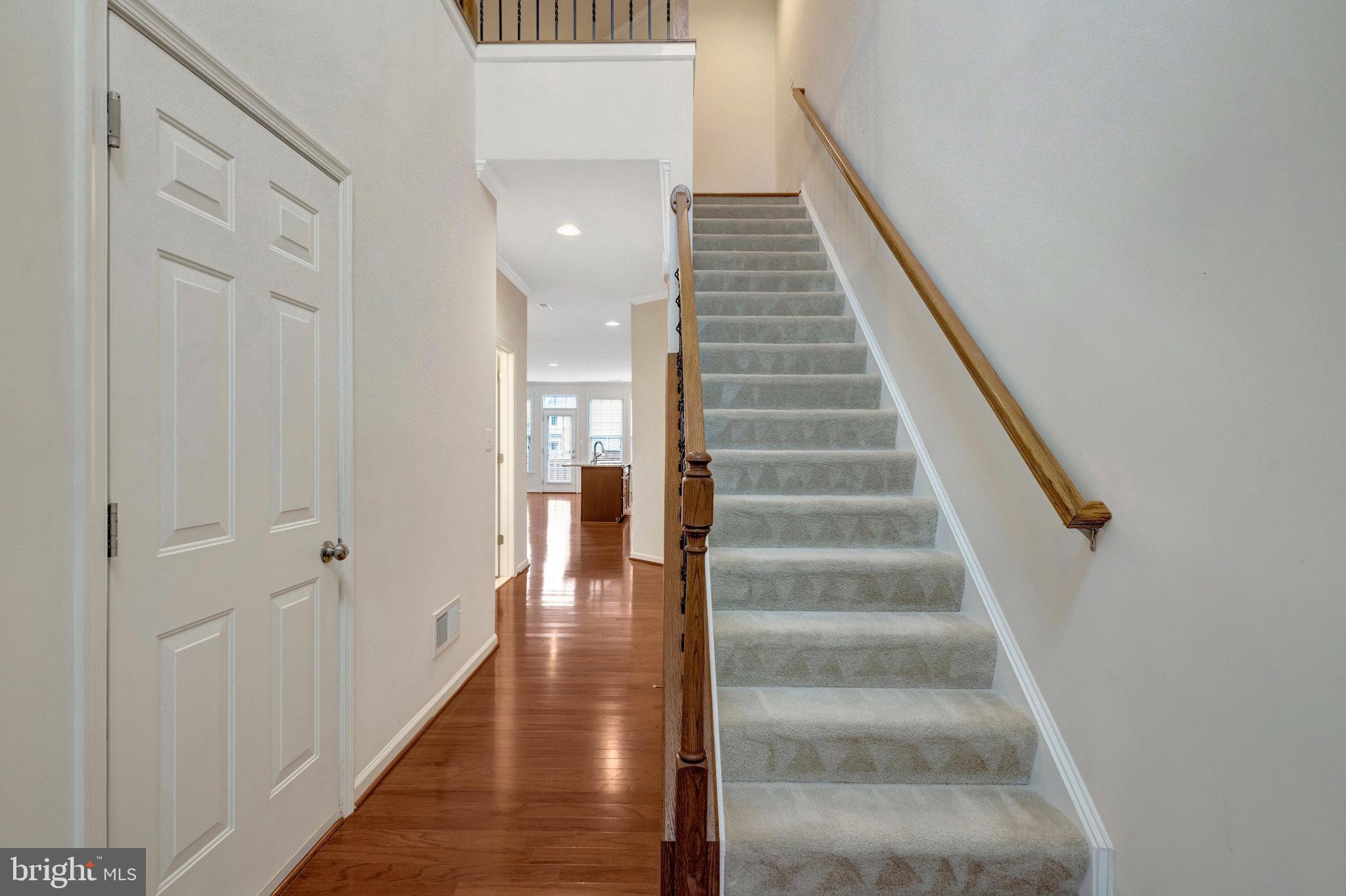 41841 Diabase Square Aldie, VA 20105 - Photo 3 of 45 a view of staircase with white walls and white door
