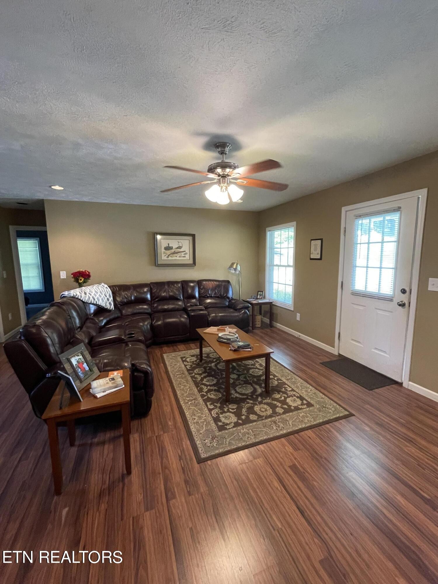 421 Delaware Avenue Oak Ridge, TN 37830 - Photo 11 of 34 a living room with furniture and wooden floor