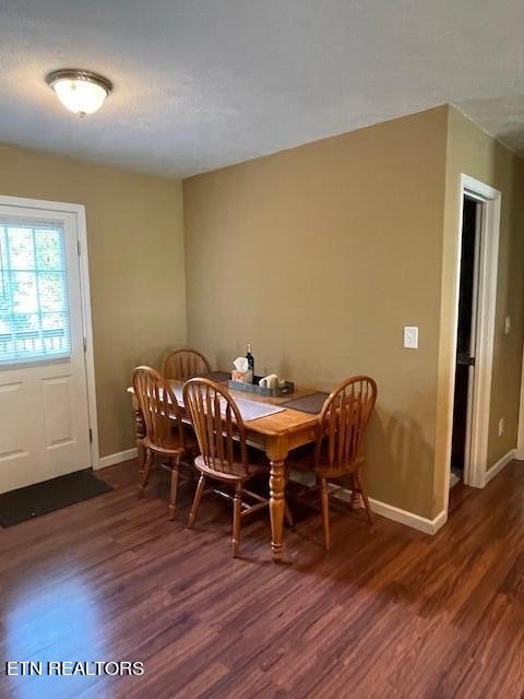 421 Delaware Avenue Oak Ridge, TN 37830 - Photo 13 of 34 a dining room with furniture and wooden floor