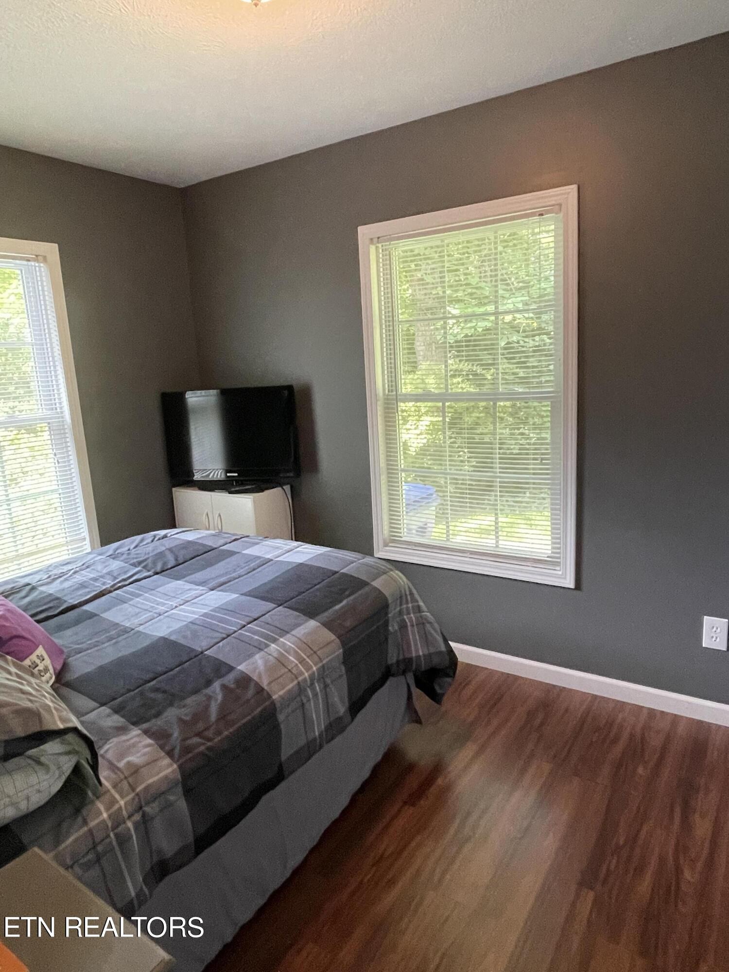 421 Delaware Avenue Oak Ridge, TN 37830 - Photo 34 of 34 a bedroom with a bed and window