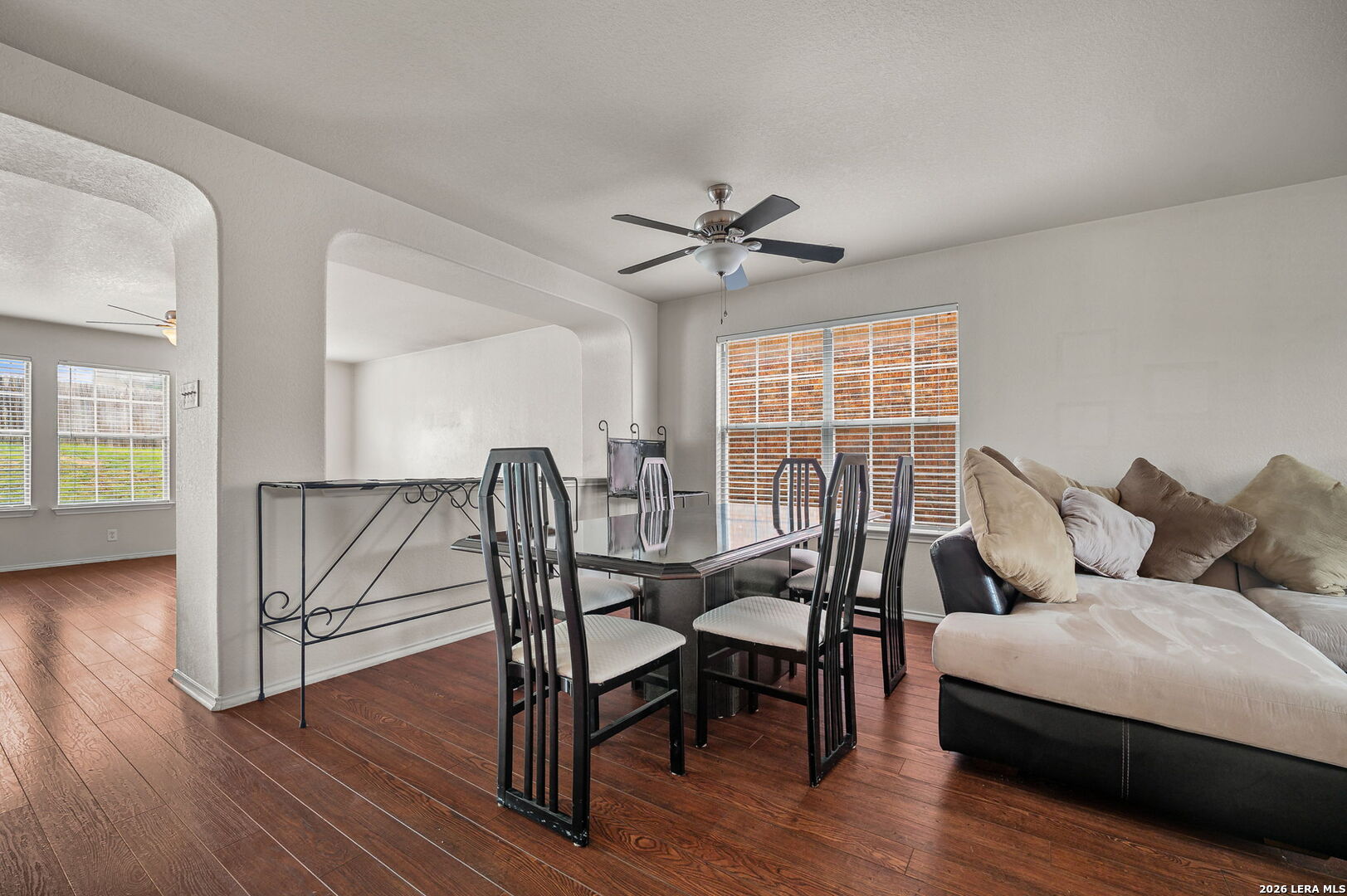 7207 Avery Road Live Oak, TX 78233 - Photo 8 of 32 a living room with furniture and a wooden floor