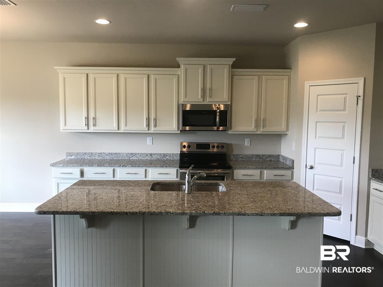 1406 Hickory Street South, Unit 5 Foley, AL 36535 - Photo 5 of 18 Kitchen Island