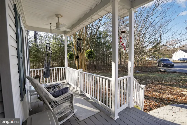 a view of a porch with furniture