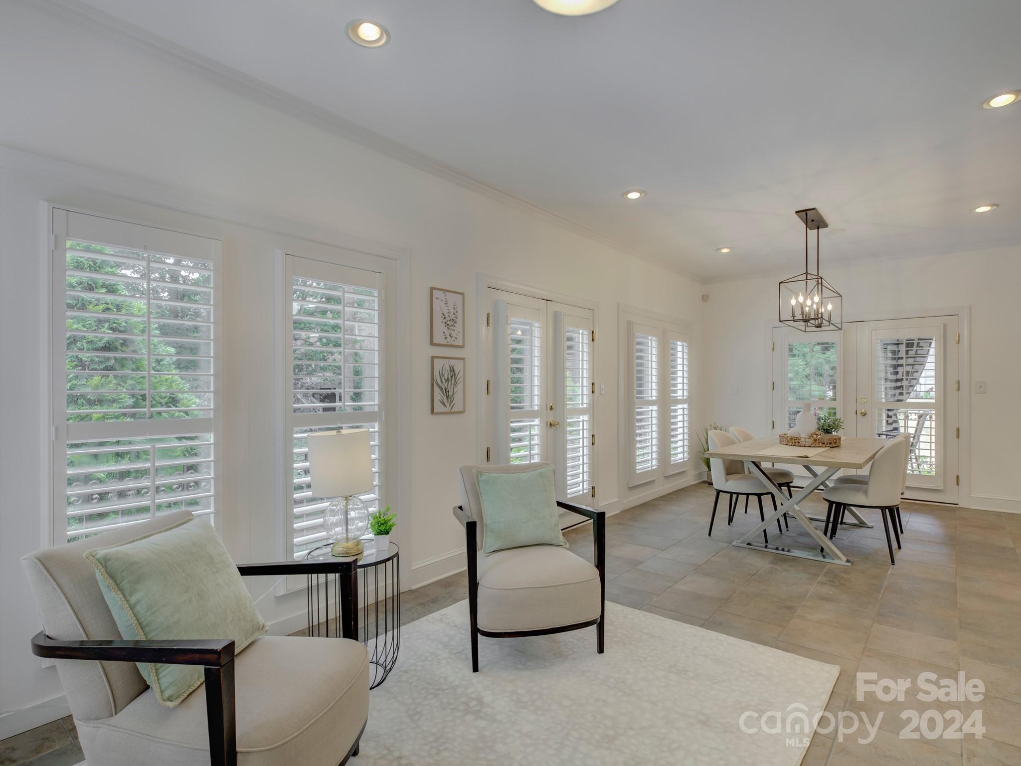 4440 Canoebrook Road Charlotte, NC 28210 - Photo 20 of 47 a living room with furniture and a large window