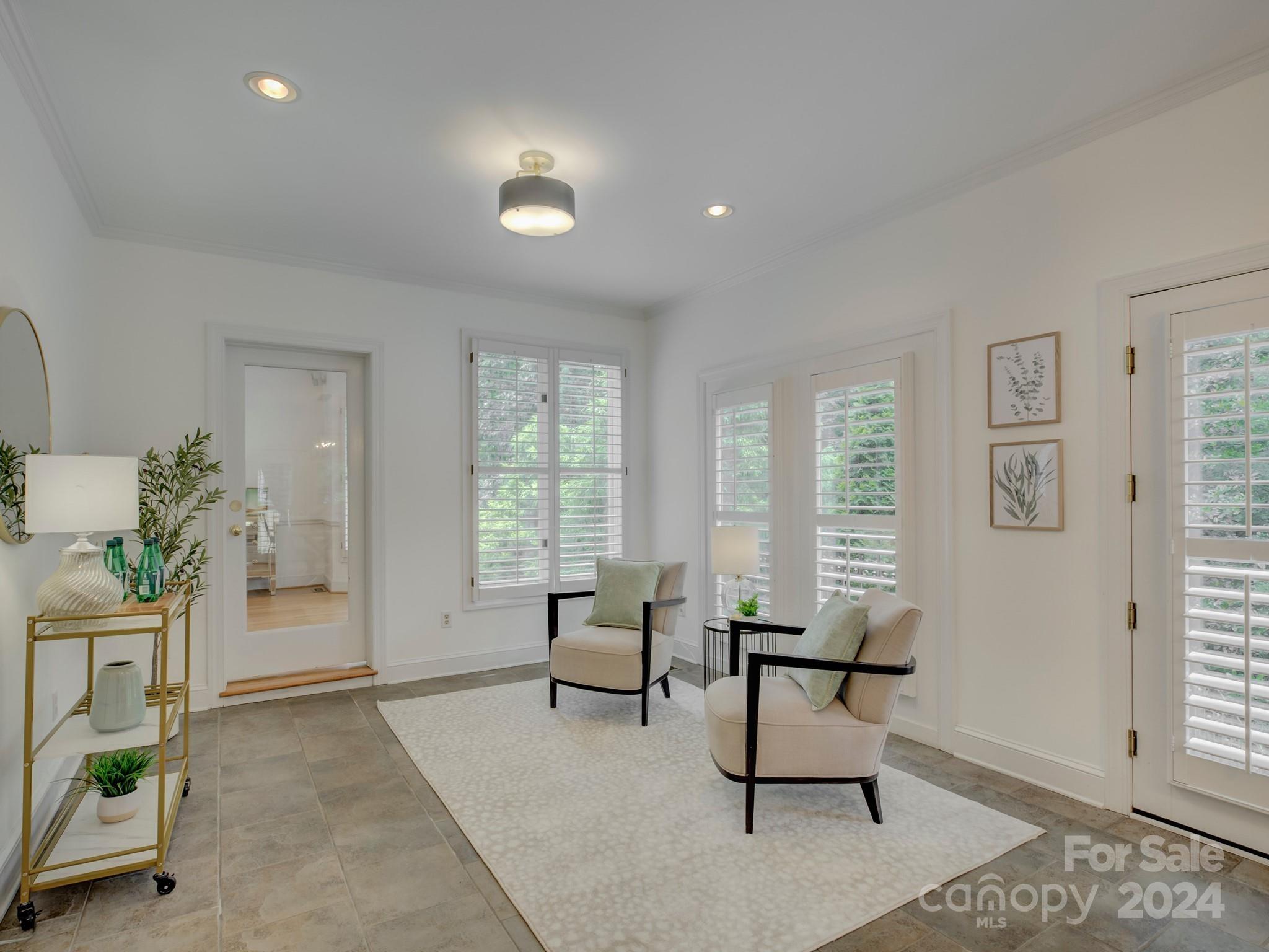 4440 Canoebrook Road Charlotte, NC 28210 - Photo 21 of 47 a living room with furniture and a window