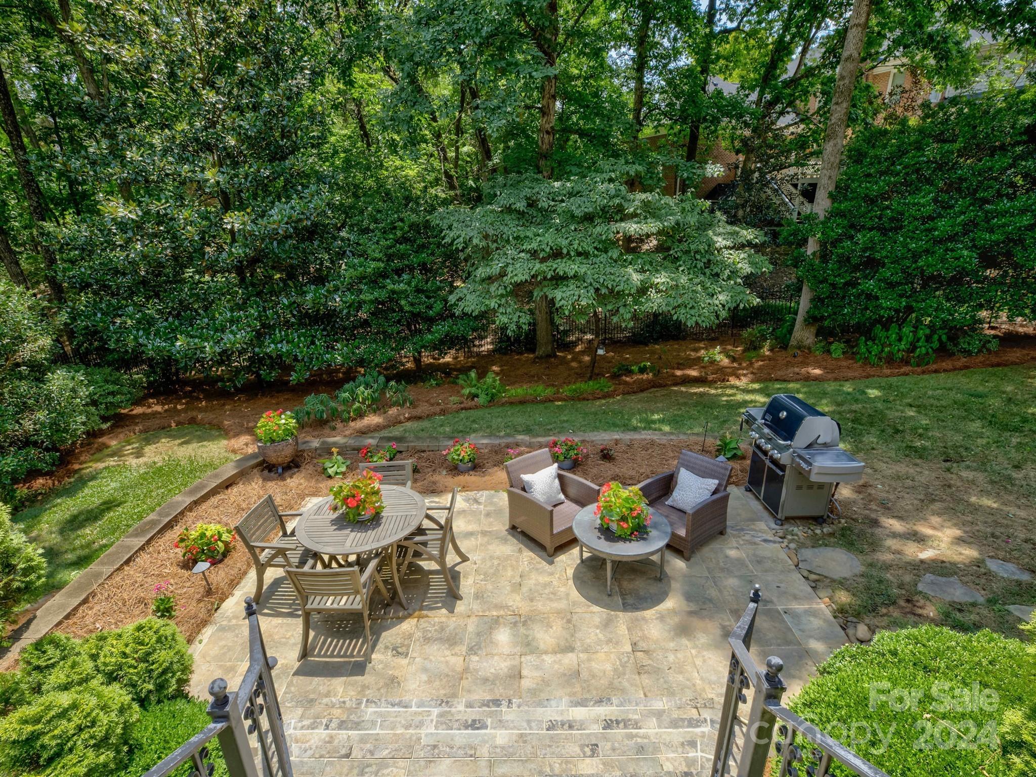 4440 Canoebrook Road Charlotte, NC 28210 - Photo 41 of 47 an outdoor space with furniture and garden