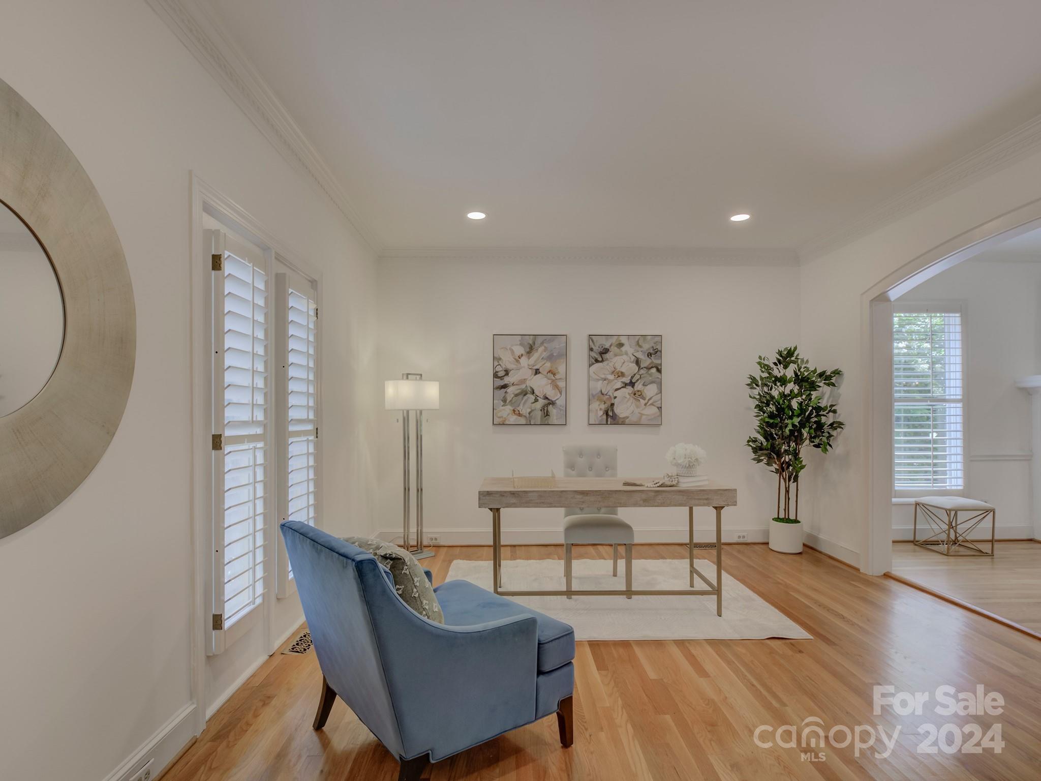 4440 Canoebrook Road Charlotte, NC 28210 - Photo 6 of 47 a living room with furniture and a potted plant