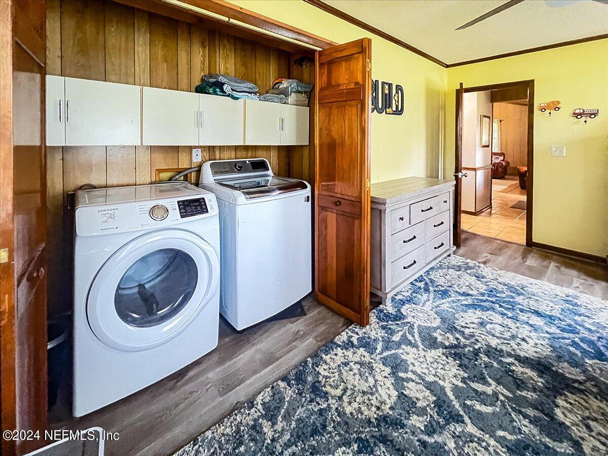 4847 Reed Avenue Jacksonville, FL 32257 - Photo 14 of 36 a view of a storage & utility room with washer and dryer