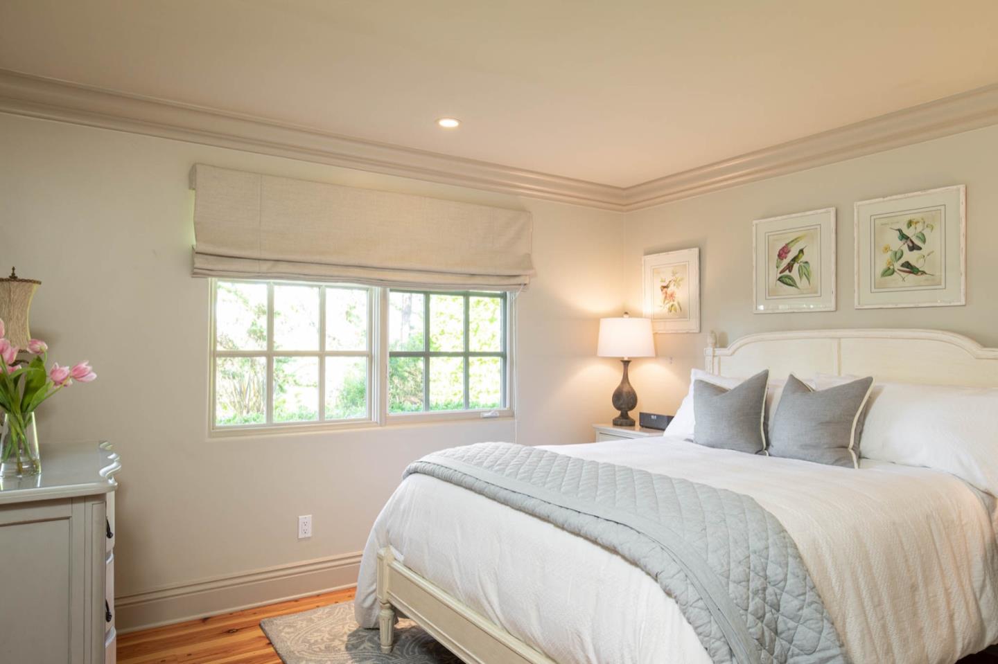 1441 Riata Road Pebble Beach, CA 93953 - Photo 8 of 21 a bedroom with a bed and a window