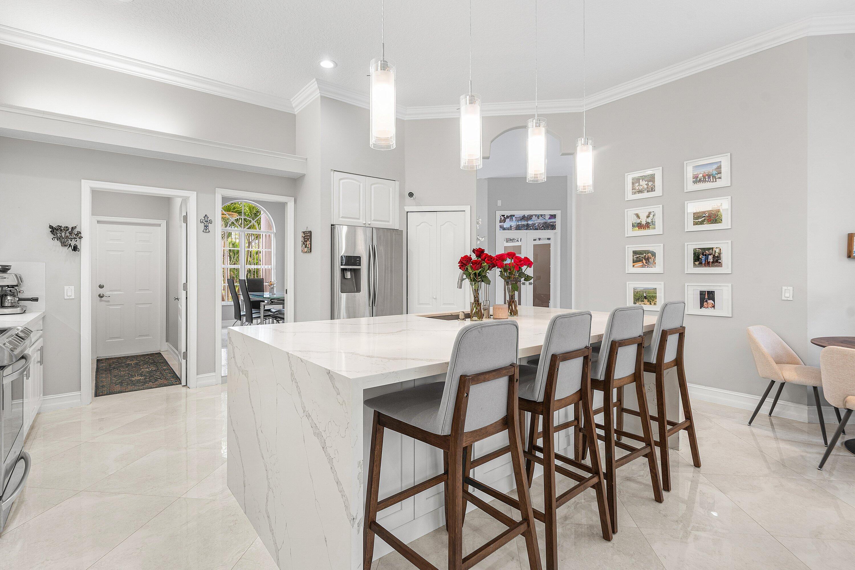 12328 85th Road North West Palm Beach, FL 33412 - Photo 16 of 51 Island with extra cabinets below