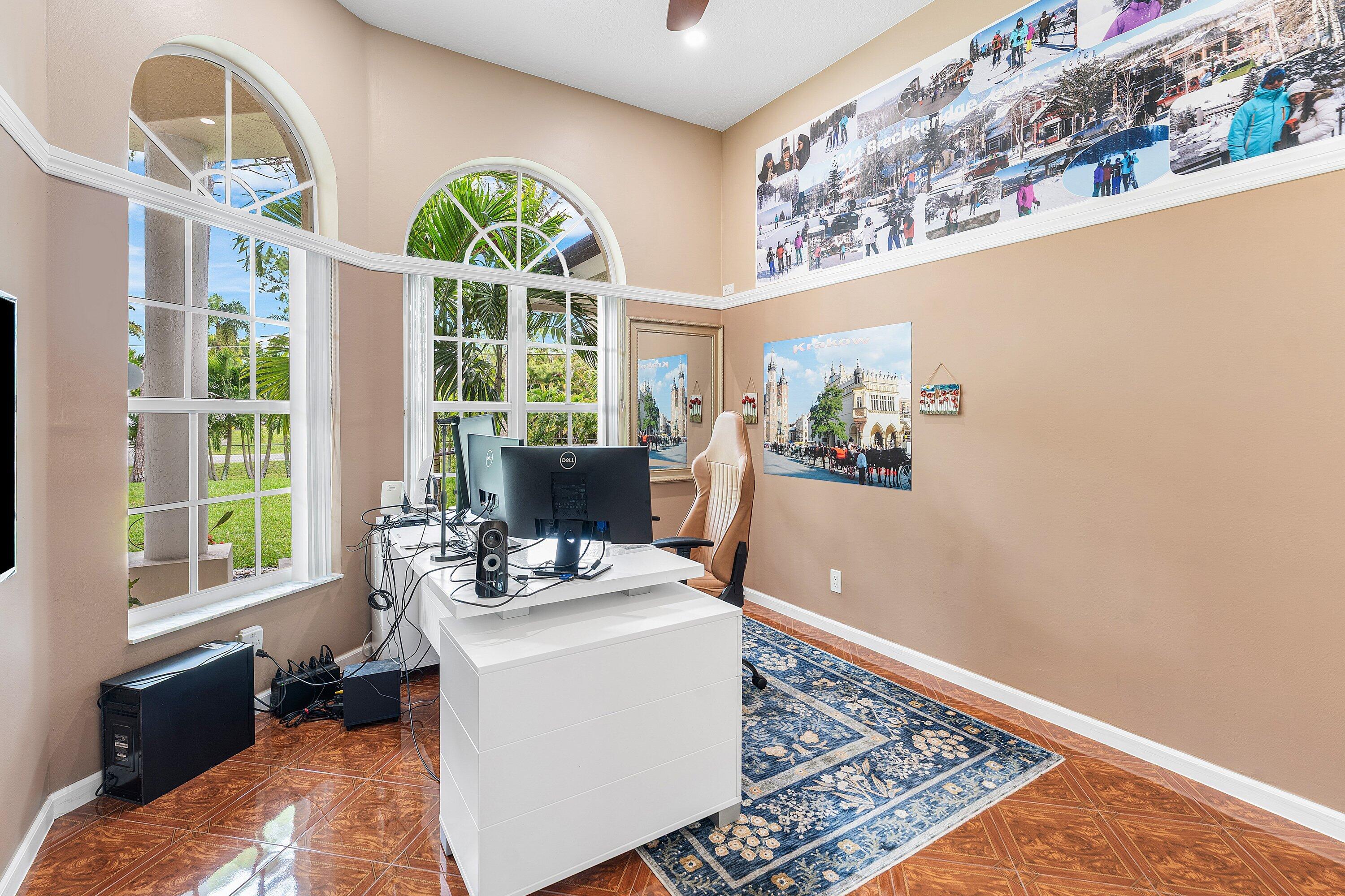 12328 85th Road North West Palm Beach, FL 33412 - Photo 27 of 51 a living room with furniture and a large window