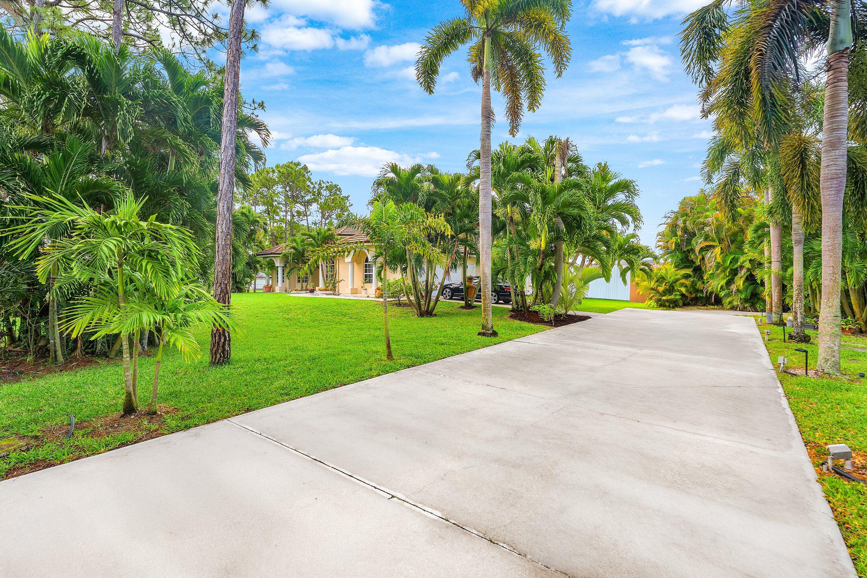 12328 85th Road North West Palm Beach, FL 33412 - Photo 3 of 51 Entry driveway