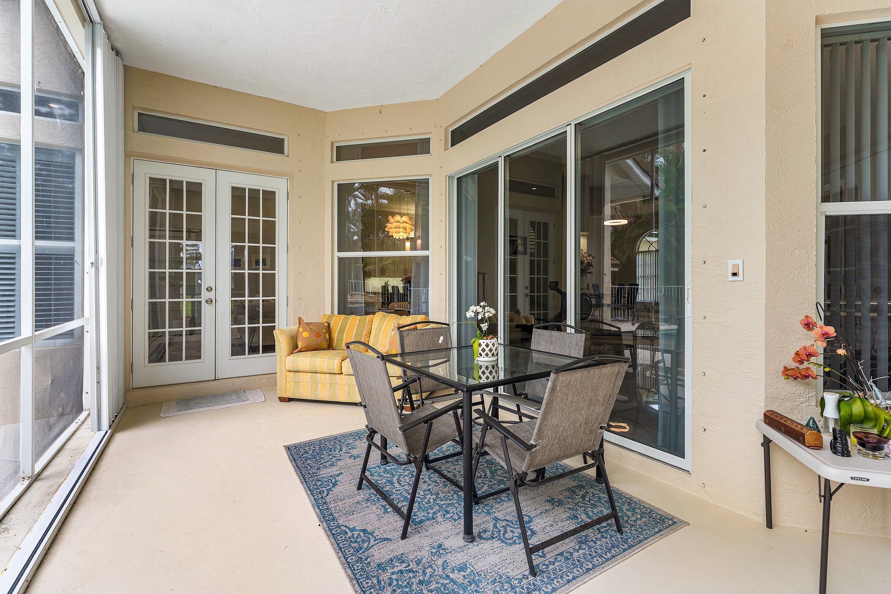 12328 85th Road North West Palm Beach, FL 33412 - Photo 35 of 51 Back screen-in porch