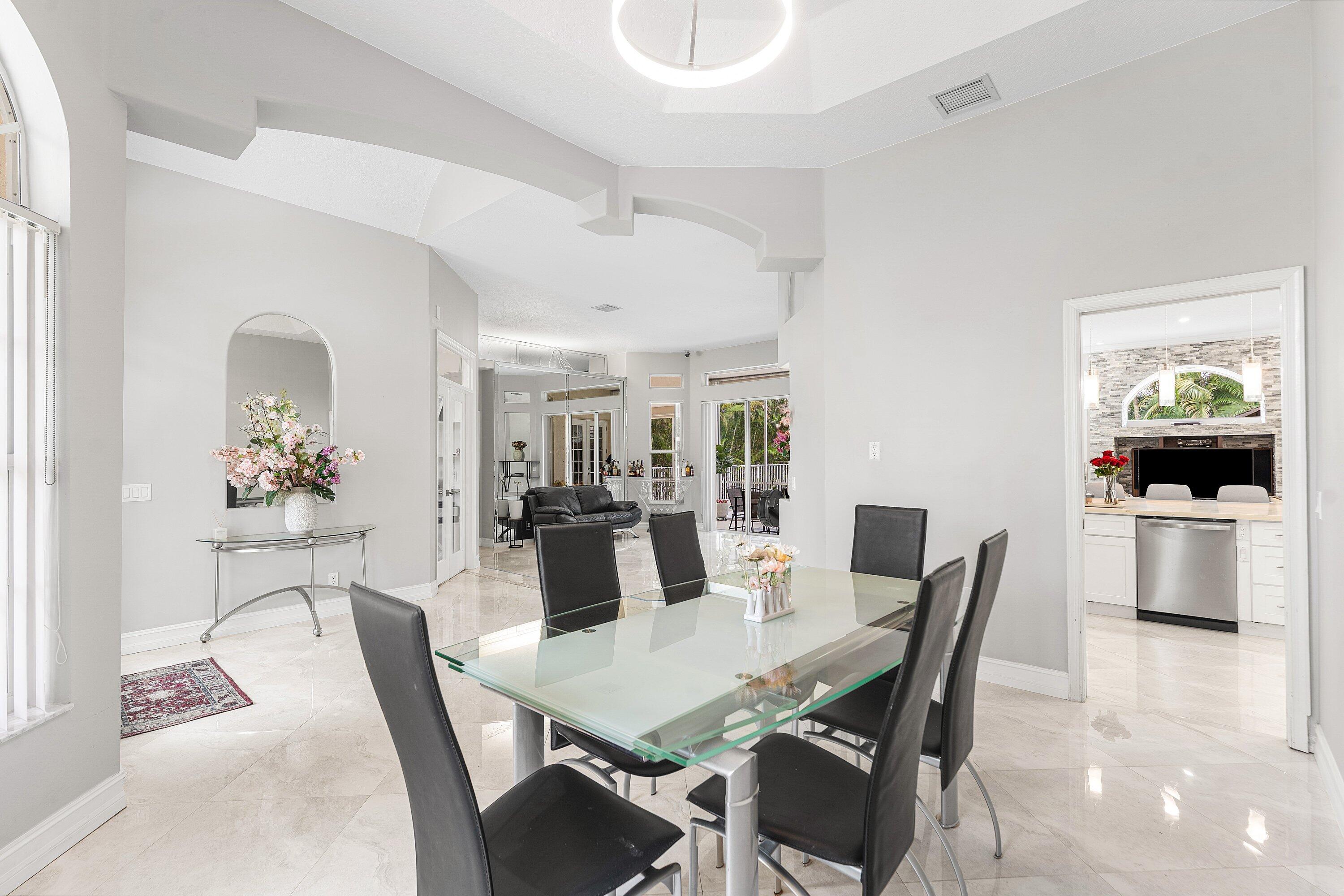12328 85th Road North West Palm Beach, FL 33412 - Photo 8 of 51 a view of a dining room with furniture