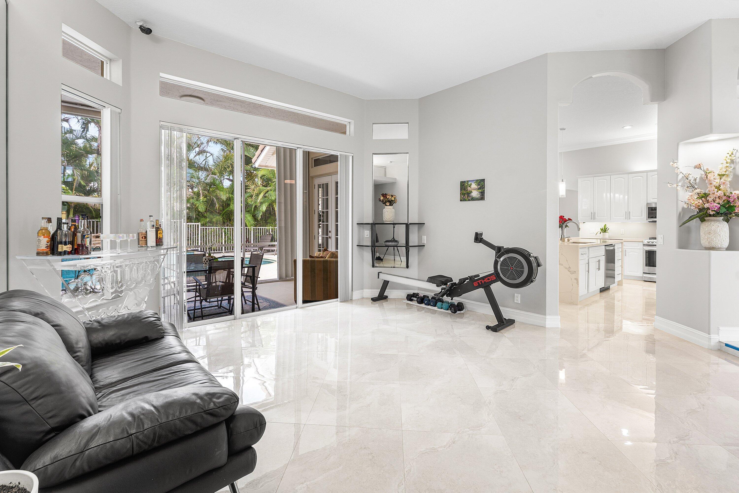 12328 85th Road North West Palm Beach, FL 33412 - Photo 9 of 51 a view of a livingroom with couch and a large window