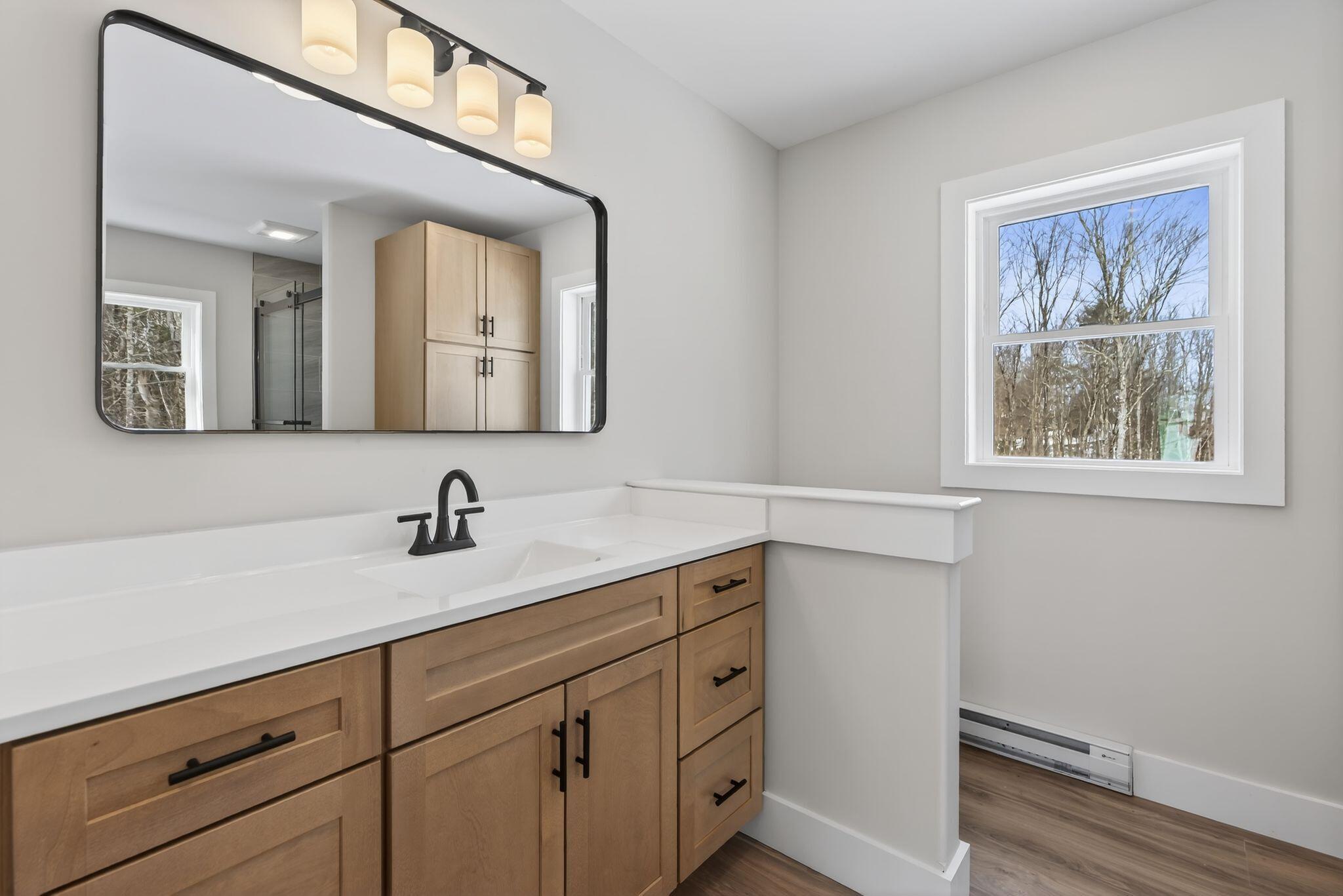 8 Hummingbird Lane Sanford, ME 04073 - Photo 15 of 46 Privacy Wall Between Sink & Commode