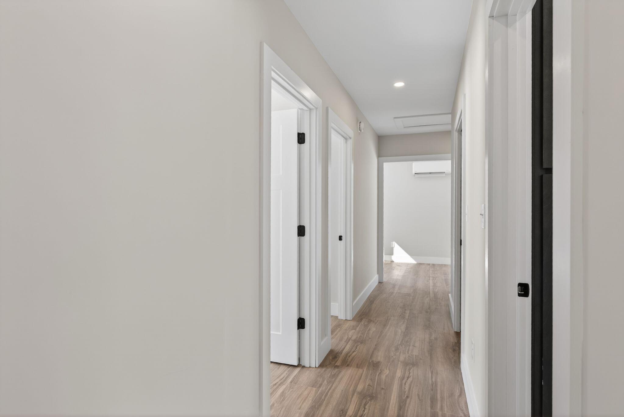 8 Hummingbird Lane Sanford, ME 04073 - Photo 18 of 46 Hallway to Guest Wing