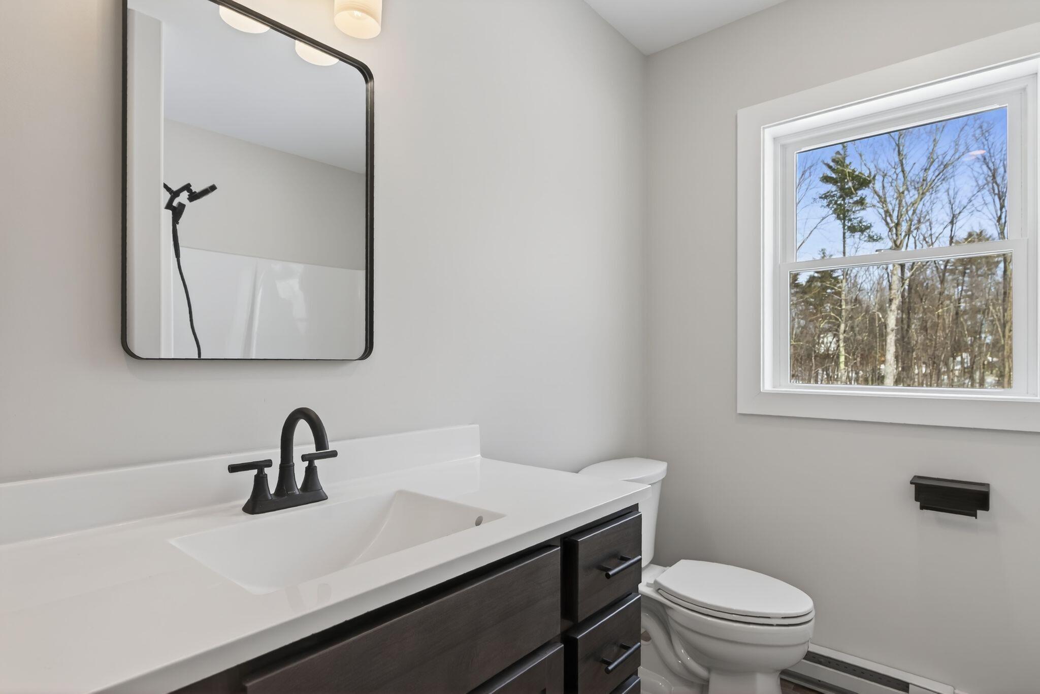 8 Hummingbird Lane Sanford, ME 04073 - Photo 23 of 46 Guest Bathroom With Tub