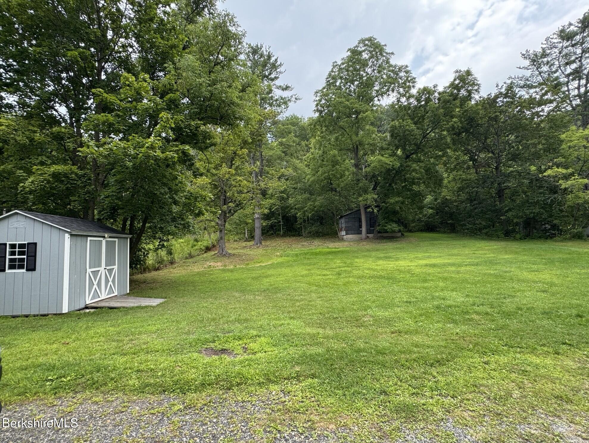 672-676 North Hoosac Road Williamstown, MA 01267 - Photo 13 of 14 a view of a backyard with a garden