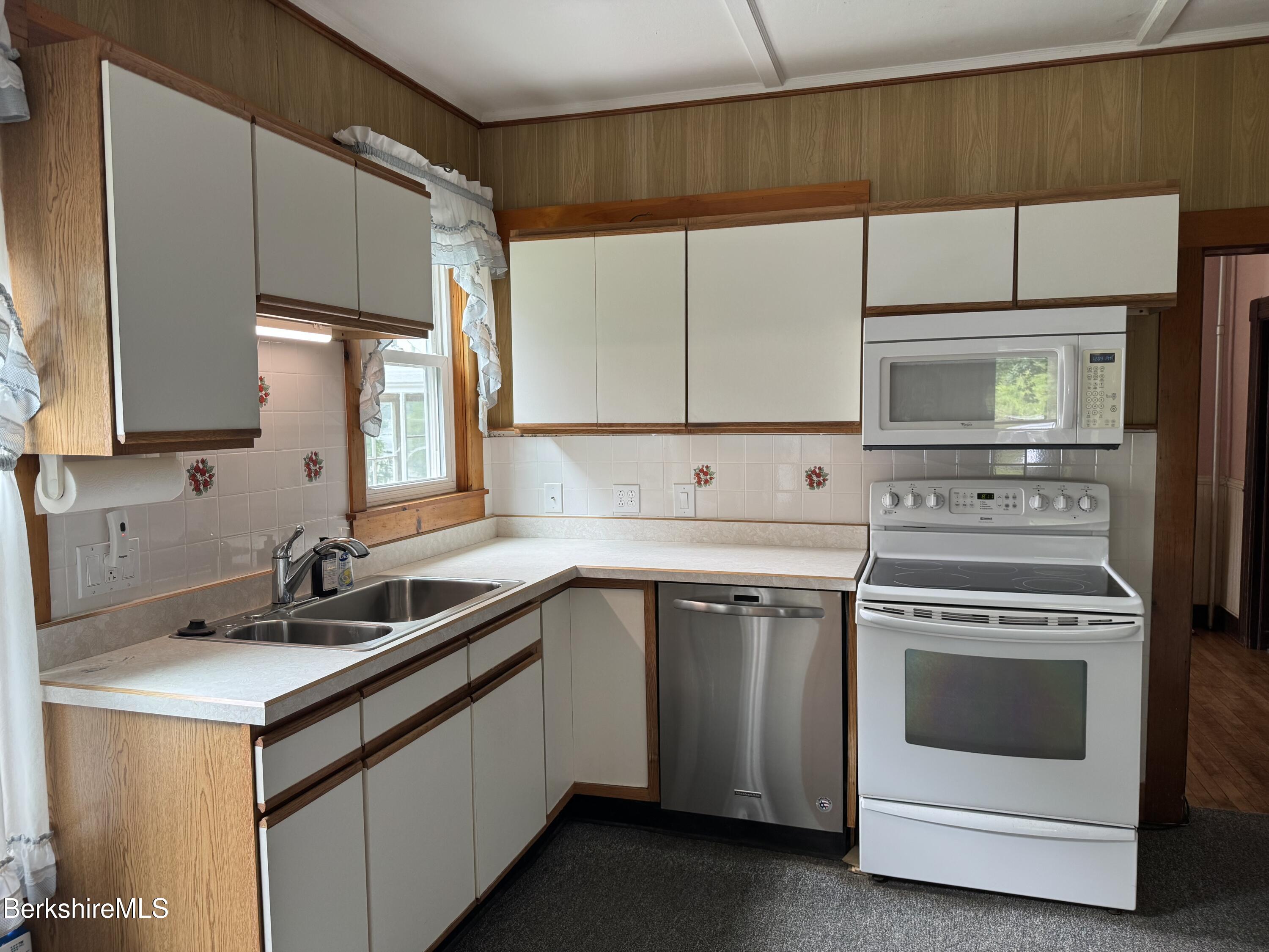 672-676 North Hoosac Road Williamstown, MA 01267 - Photo 3 of 14 a kitchen that has a sink and a stove