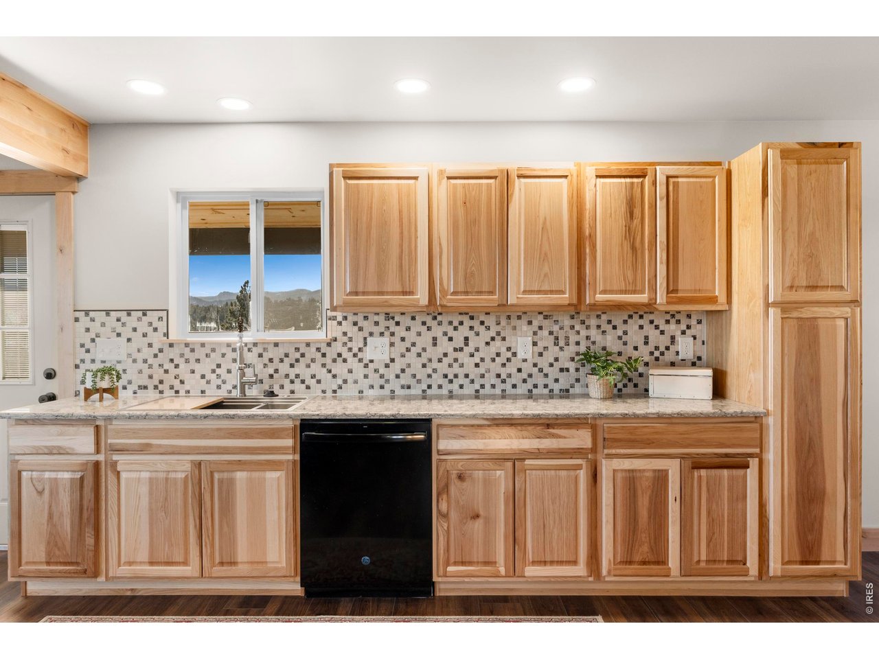 1074 Caddo Road Red Feather Lakes, CO 80545 - Photo 13 of 34 Custom Cabinetry and Backsplash