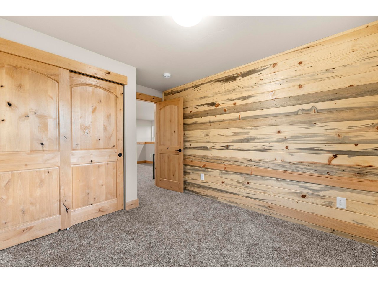 1074 Caddo Road Red Feather Lakes, CO 80545 - Photo 24 of 34 Upstairs Bedroom 2