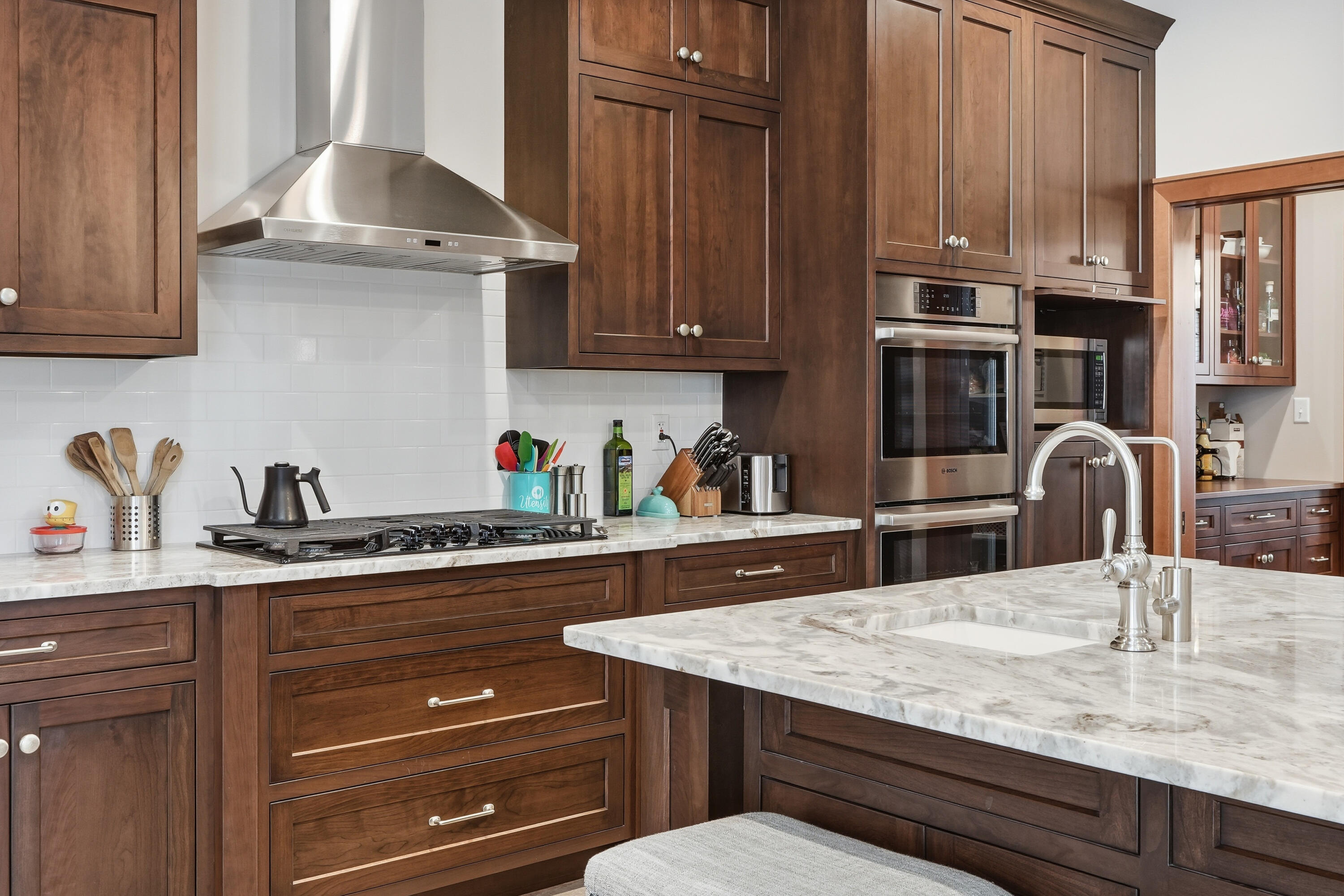 804 Shannon Drive Crown Point, IN 46307 - Photo 22 of 79 a kitchen with granite countertop a sink a stove and cabinets